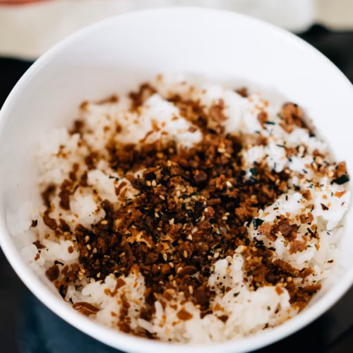 Creamy rice dessert in a bowl with a warm, home-style presentation