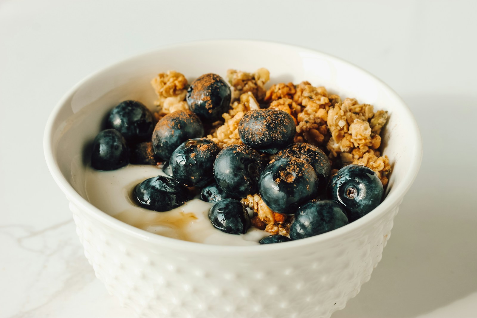 Yogurt bowl with blueberries and crunchy granola