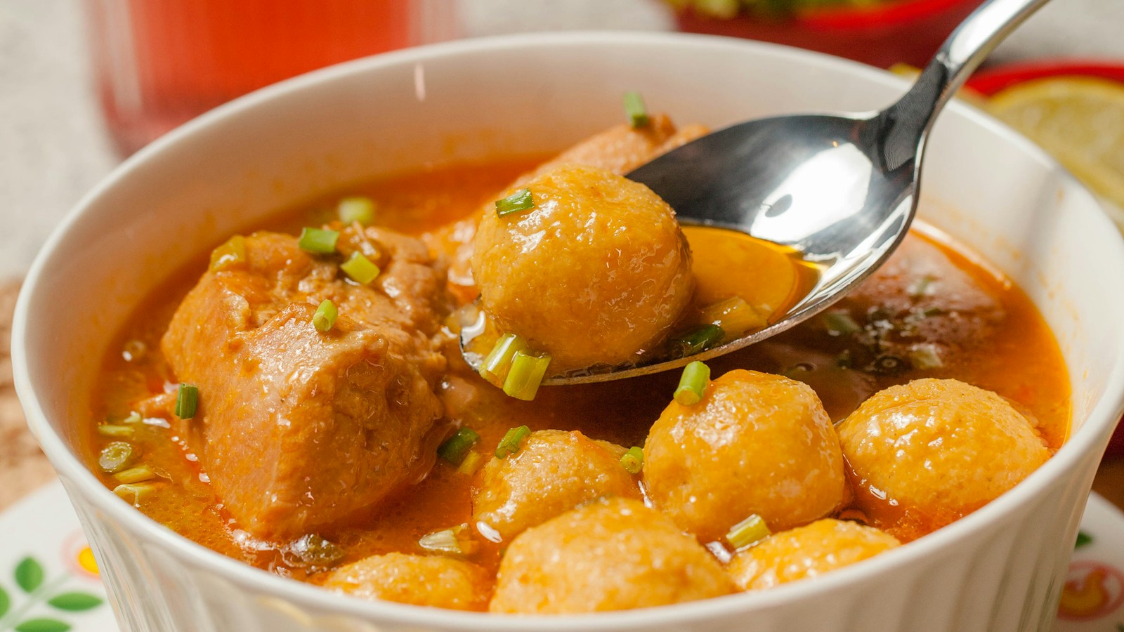 Bowl of chicken soup with vegetables, a choice for what to eat when sick