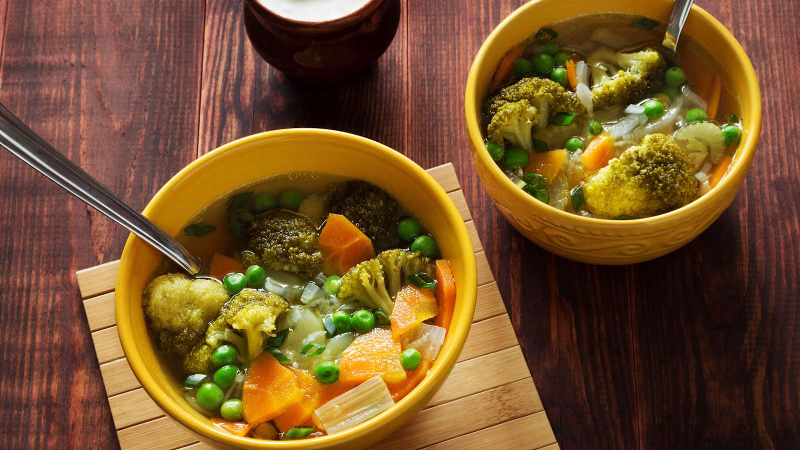 Bowls of thick green soup ready to serve