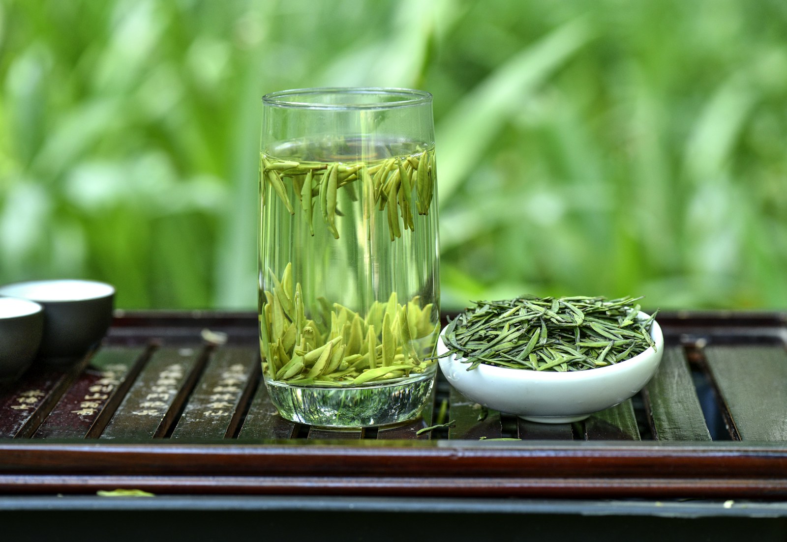 Brewed green tea in a clear cup