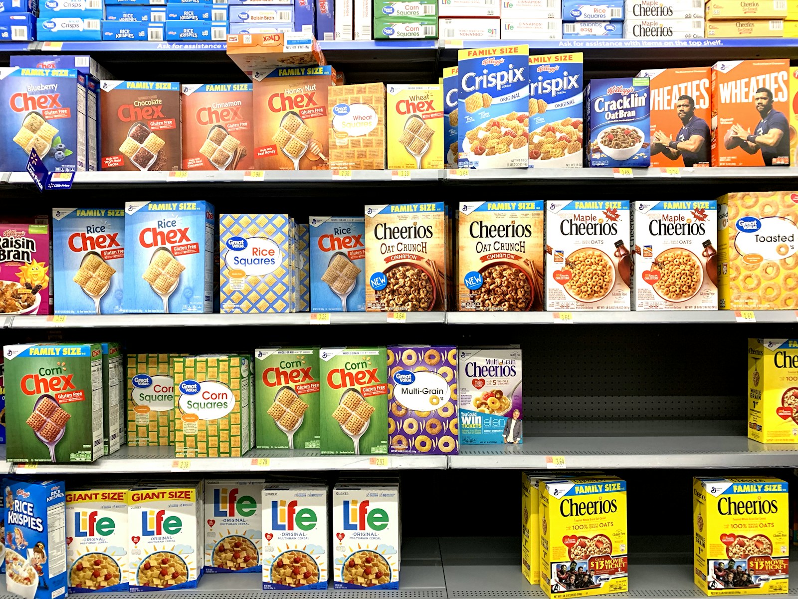 Cereal boxes lined up on grocery store shelves