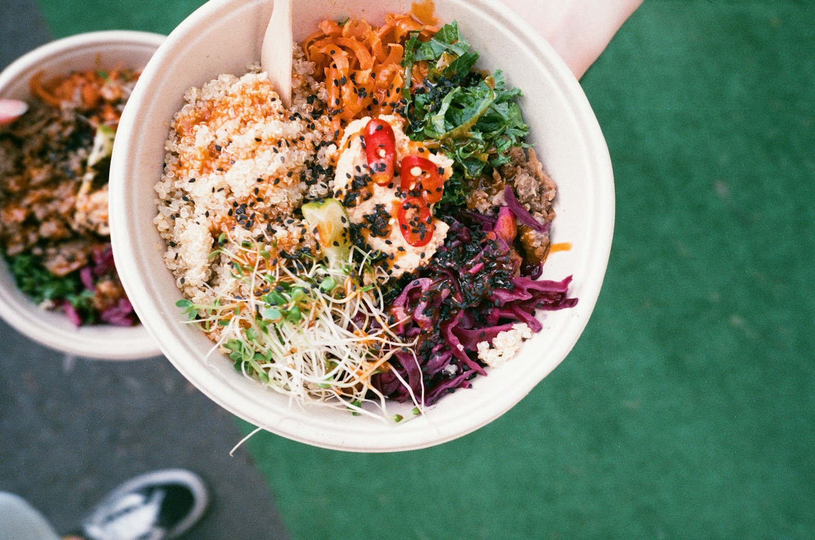 Cooked whole-grain salad in a white bowl