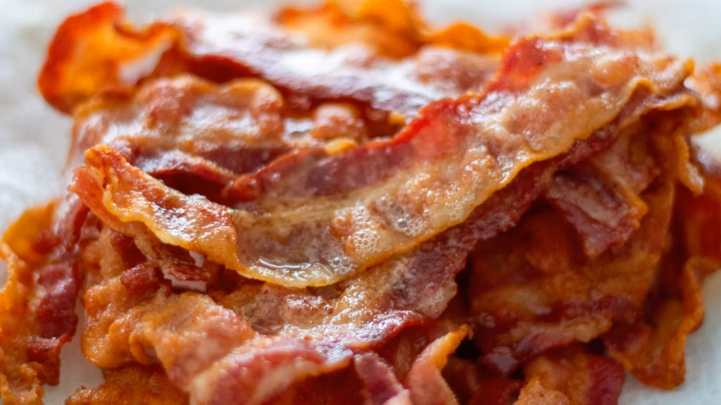 Crisp cooked thick-cut bacon strips