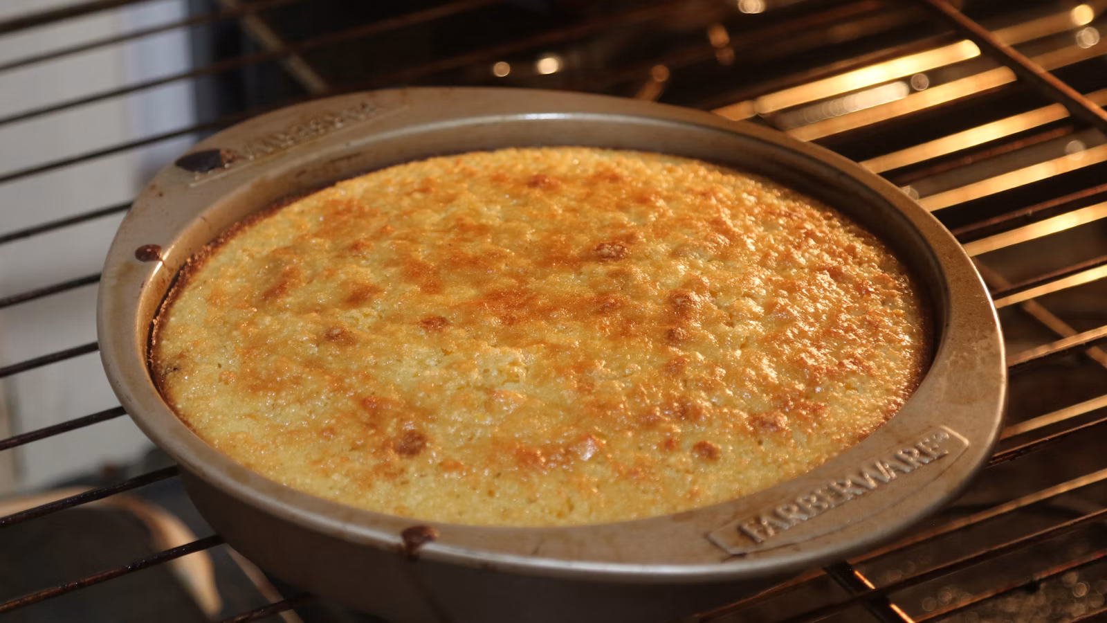 Pan of cornbread-style dressing baking in the oven