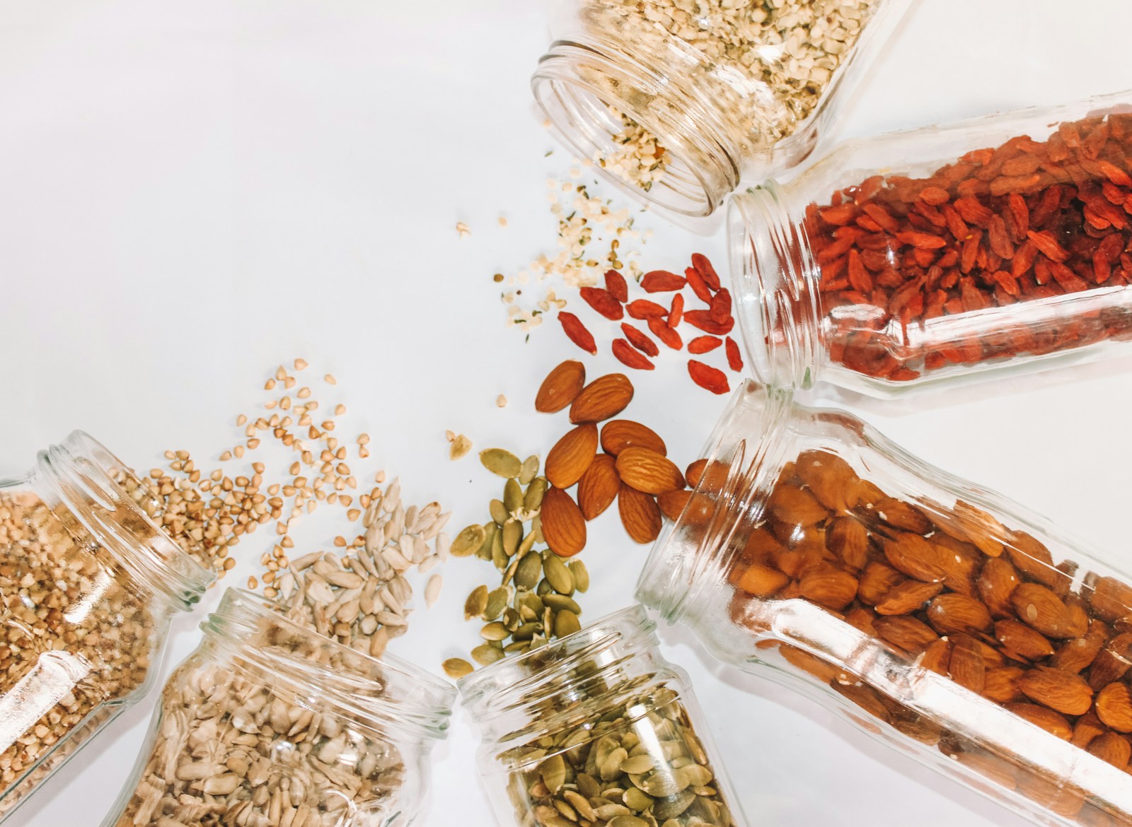 Dried pantry ingredients stored in clear glass jars