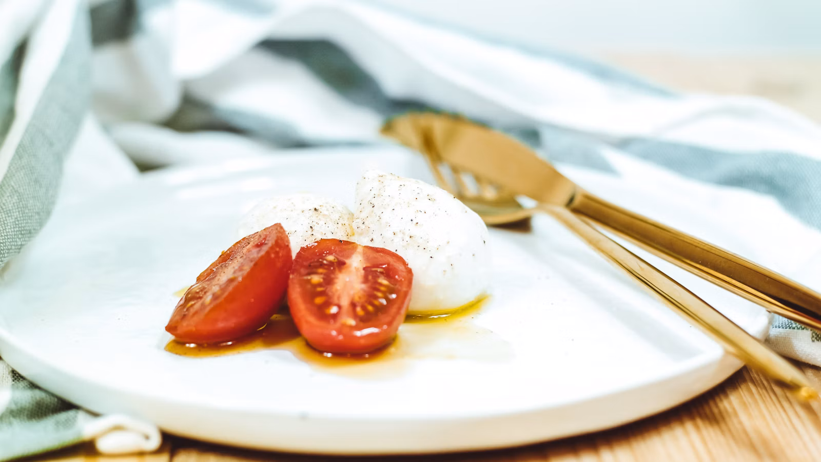 Fresh cheese arranged on a clean serving plate