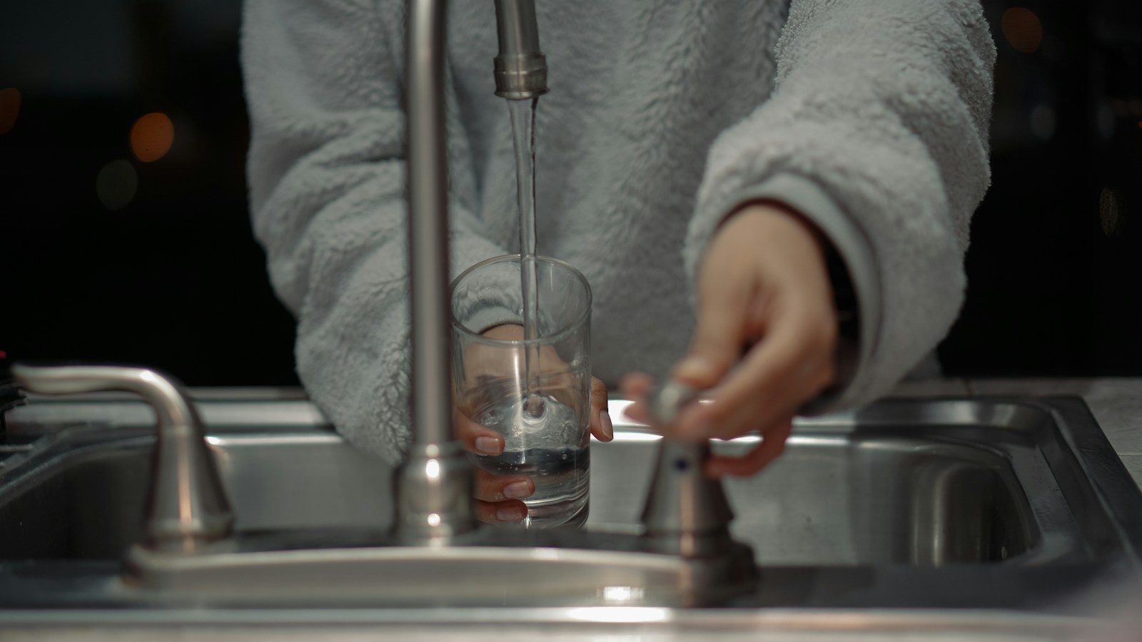 Glass of clear drinking water on a table