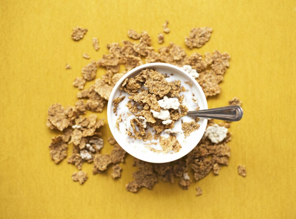 Gluten free cereal with berries and milk