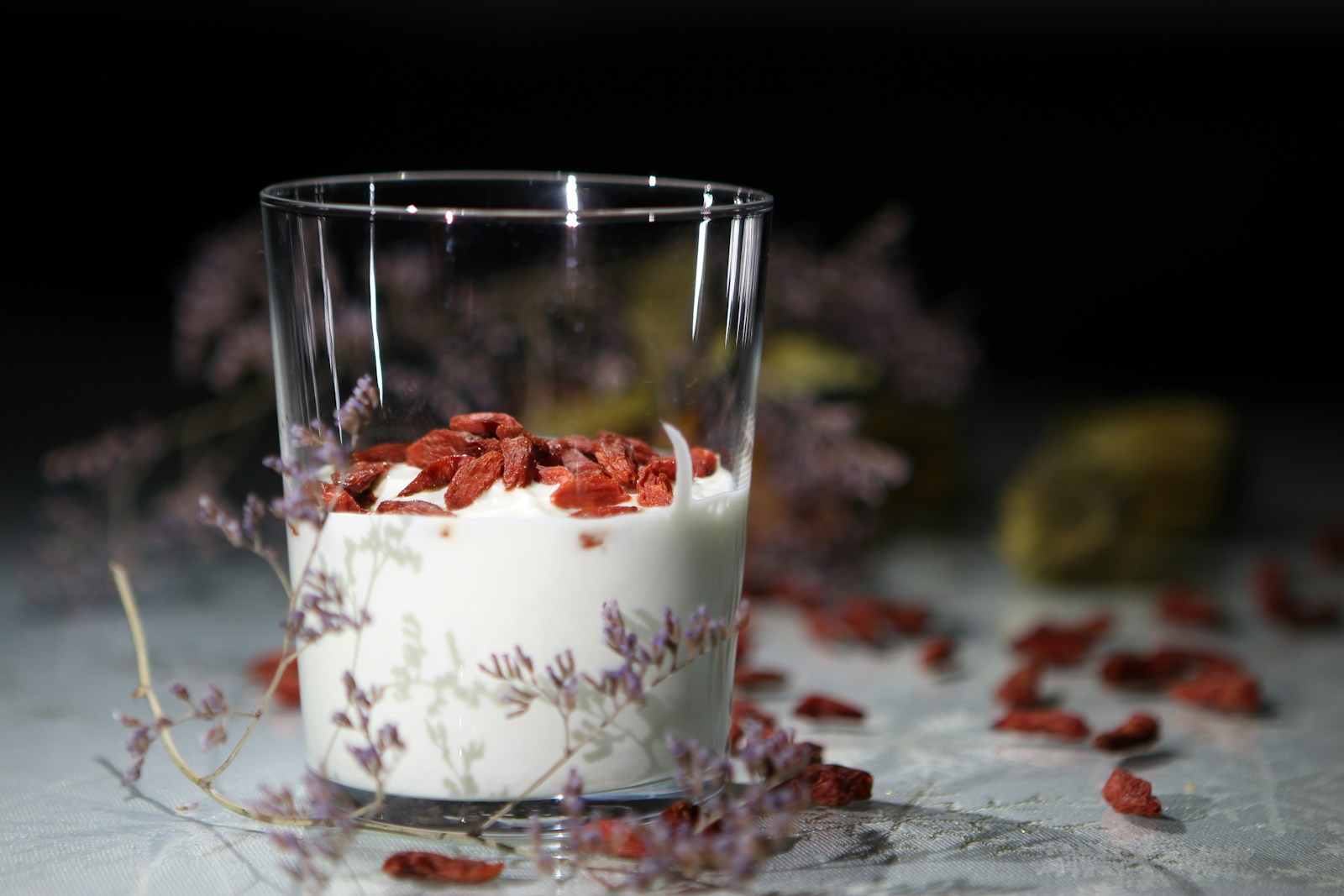 Goji berries served over a bowl of yogurt