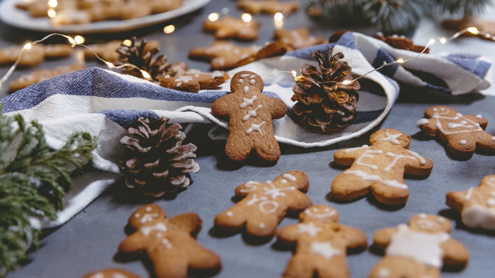 Brown holiday cookies arranged on a white plate