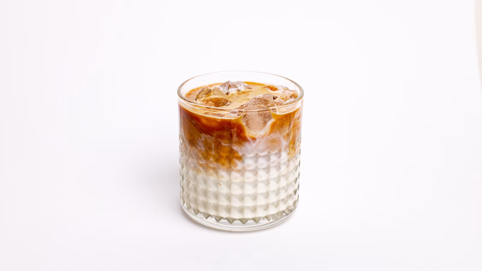 Cold coffee drink with a creamy foamed topping