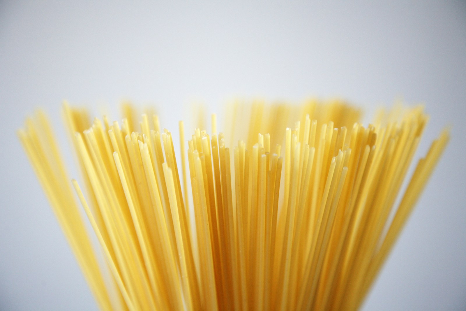 Assorted shapes of golden Italian dried pasta