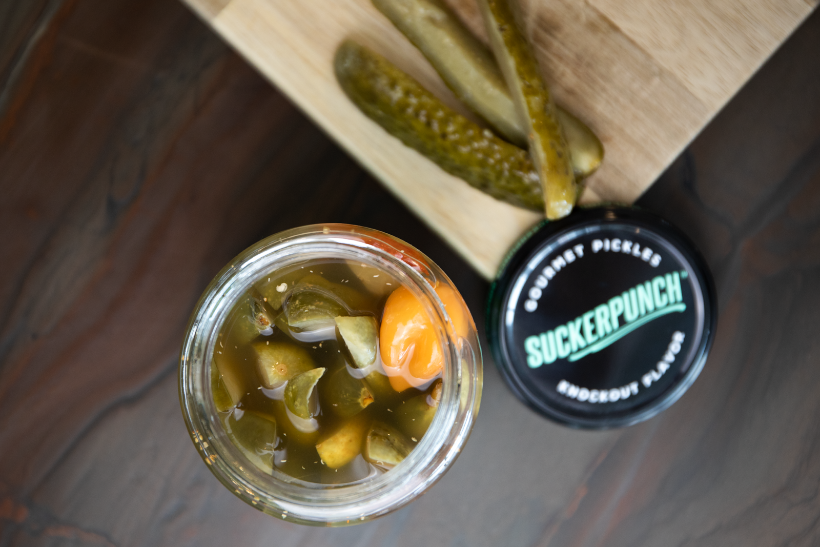 Green chili peppers packed in a jar