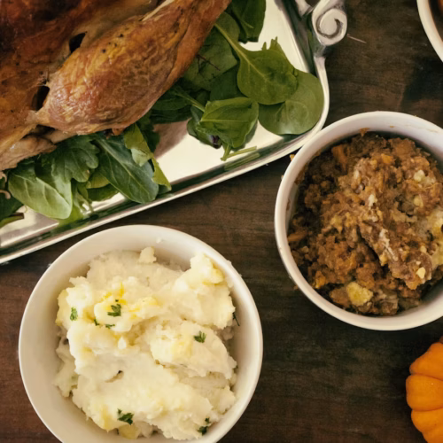 Whole roasted turkey served for Thanksgiving dinner