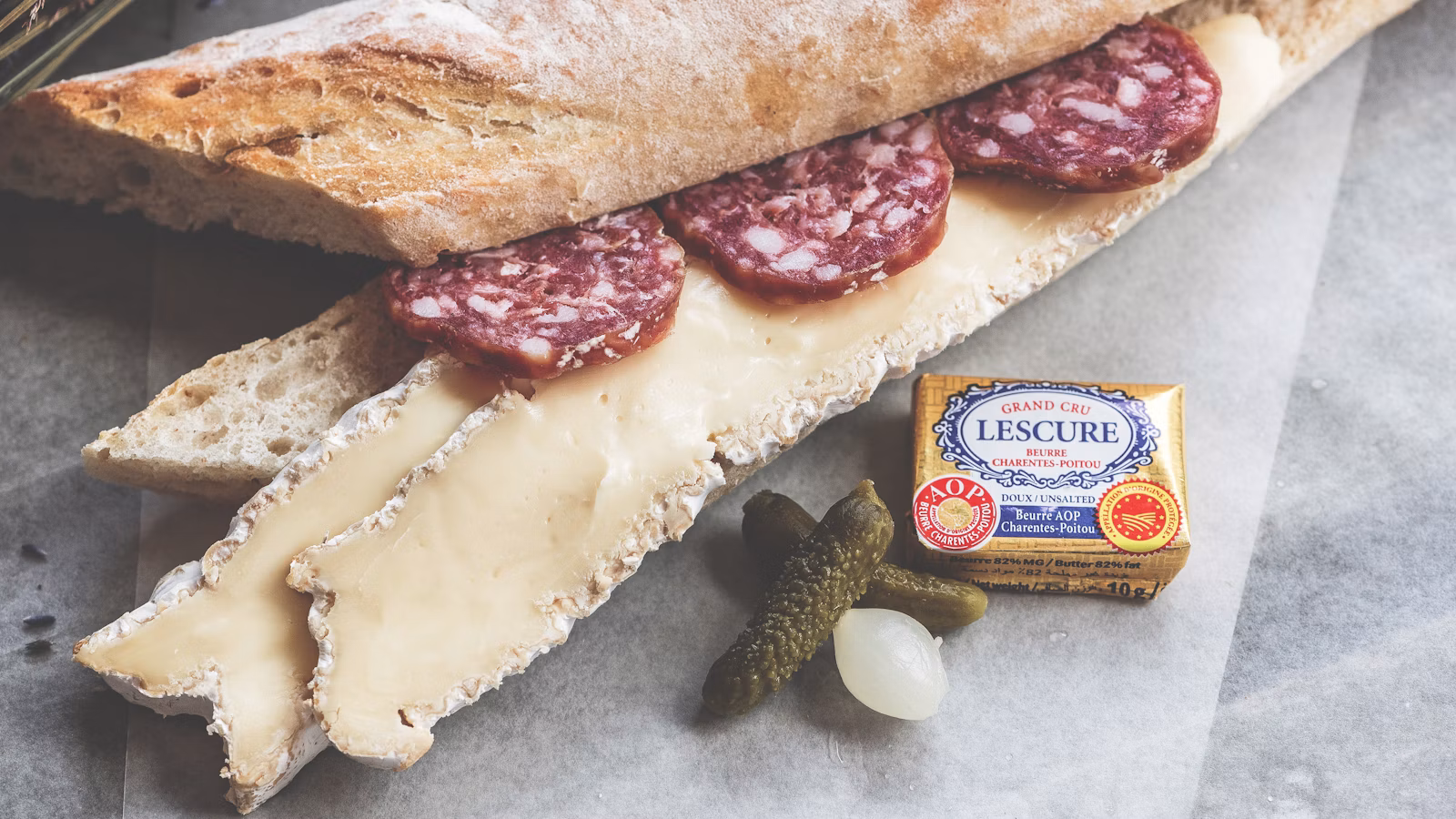 Italian salami and cheese layered in a crusty sandwich