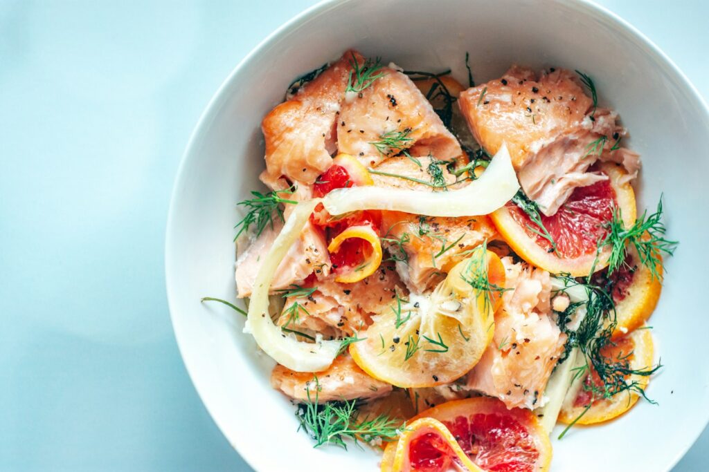 Salmon served with fresh vegetables