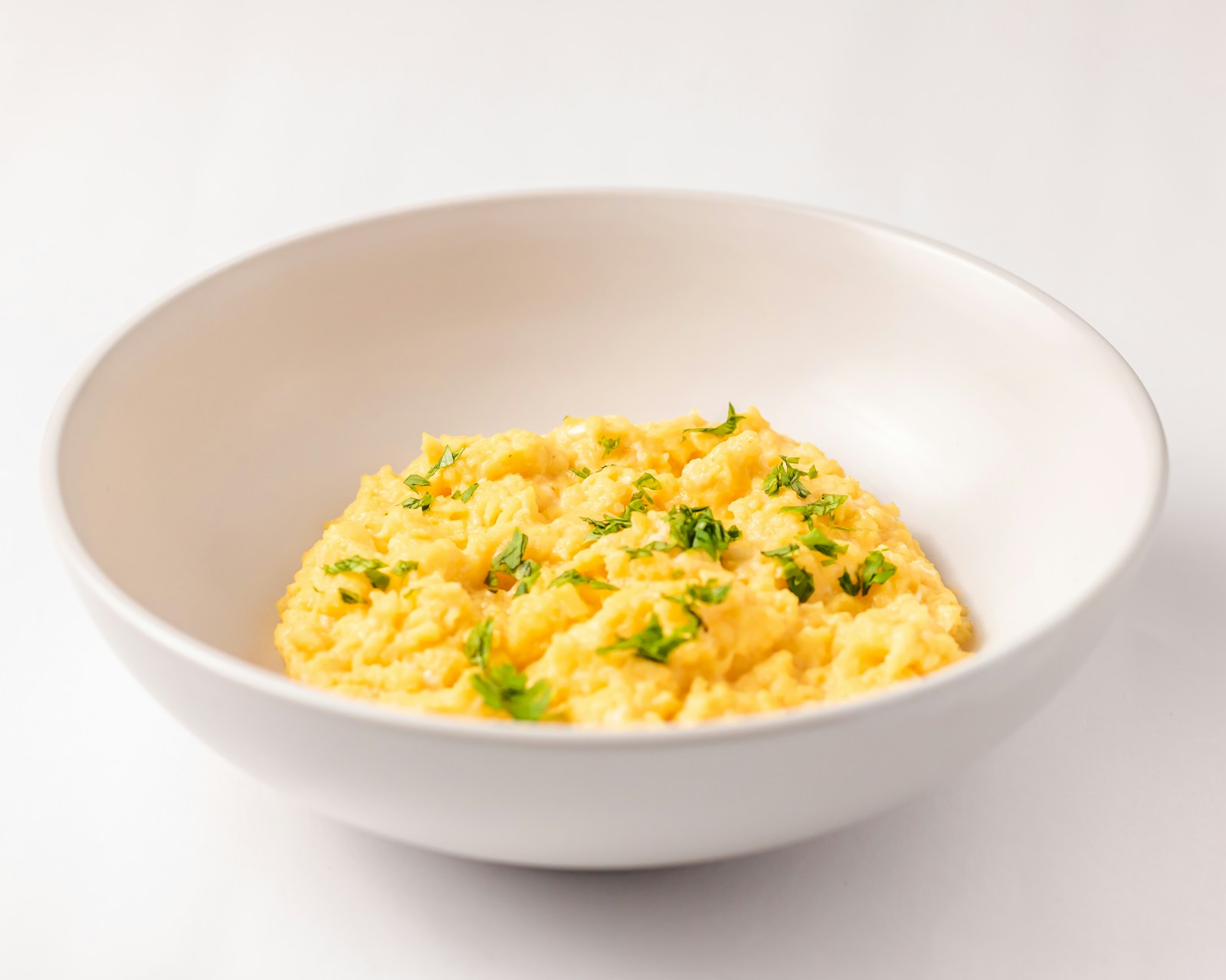 Soft scrambled eggs served in a bowl