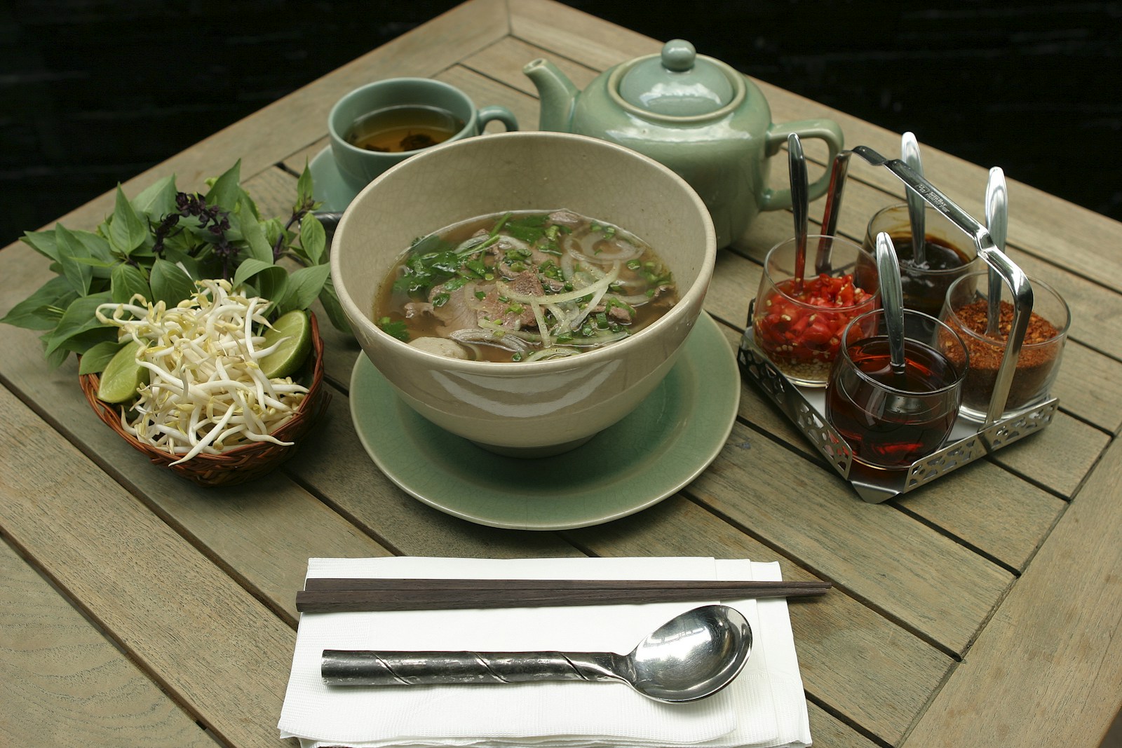 Vietnamese beef pho served with fresh herbs