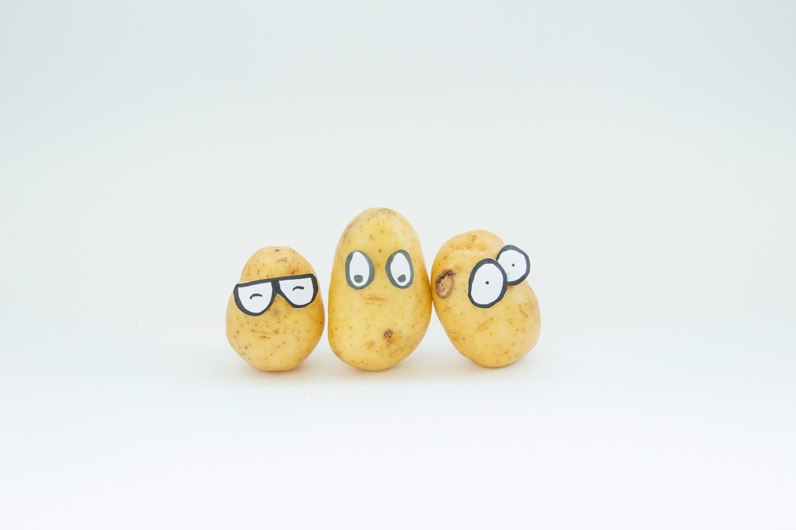 Yellow potatoes stored in a rustic kitchen setting