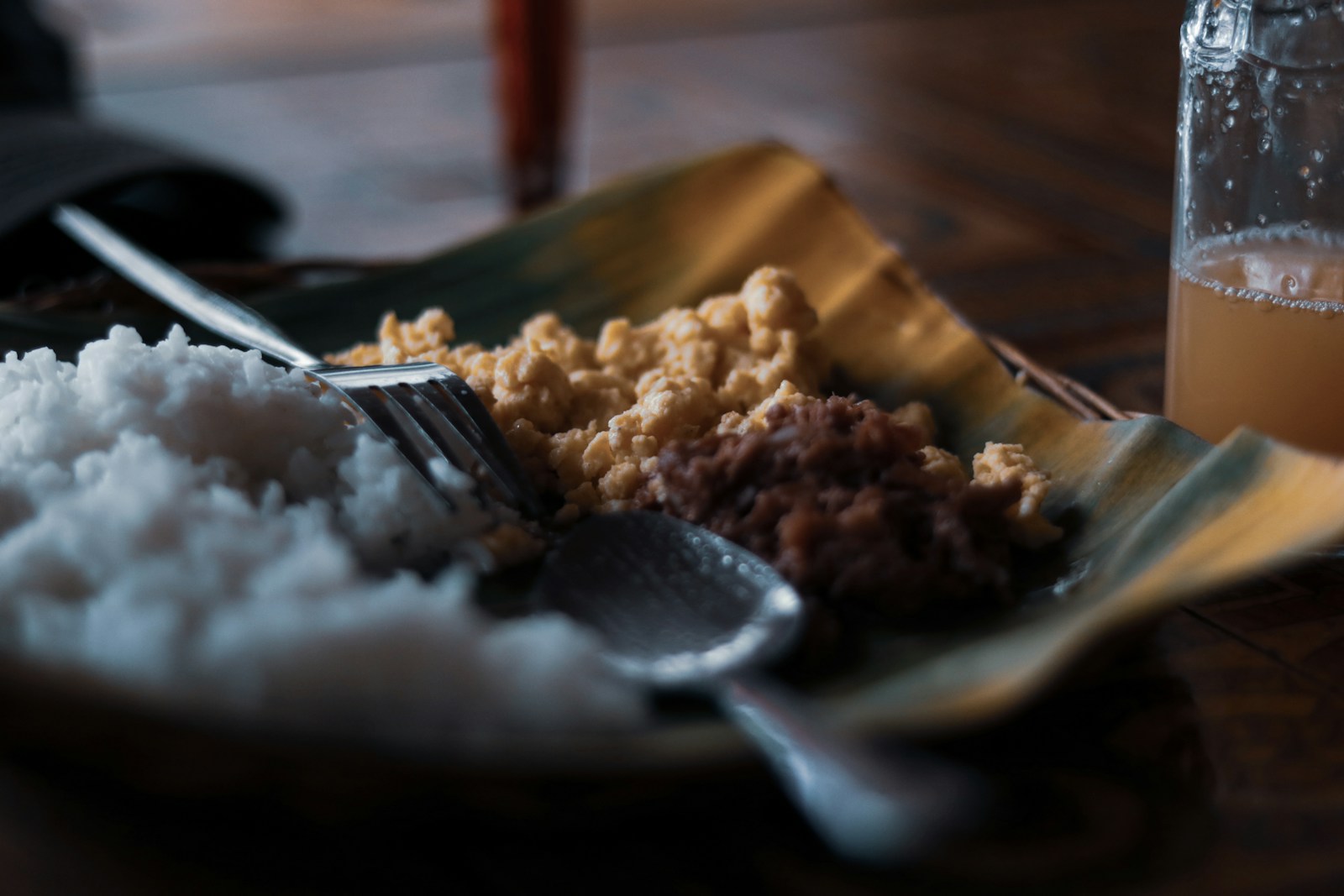 Breakfast plate with rice, eggs, and shredded meat