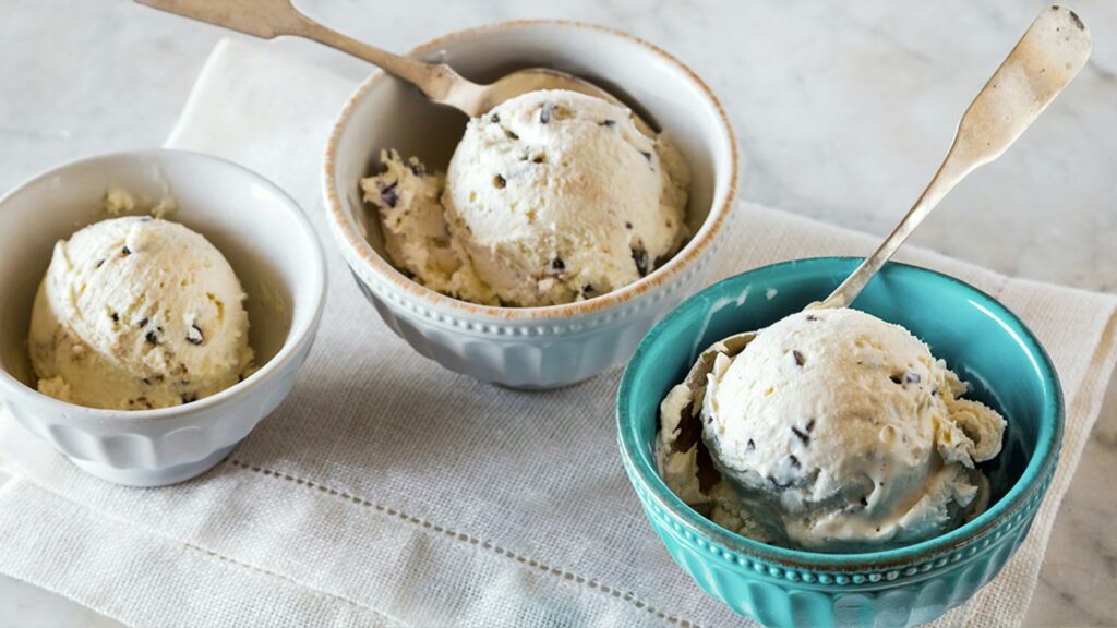 Ice cream scoops served in three small bowls